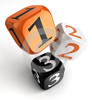 One, two and three numbers on orange black dice blocks