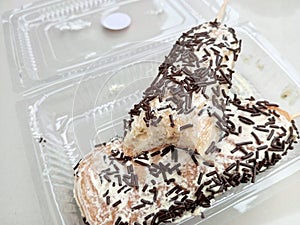one of the typical Indonesian street food which is usually called a skewer donut with many variations of toppings photo