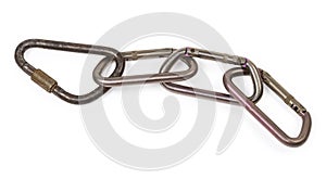 Chain of oval non-lockingÃ¢â¬â¹ and one triangular locking carabiners photo