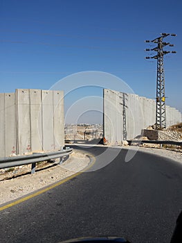 One way, gate in wall to occupied Palestinian Auth
