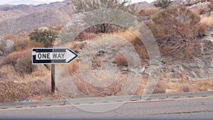 One way road sign arrow, highway roadside in California, USA road trip in desert