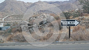 One way road sign arrow, highway roadside in California, USA road trip in desert