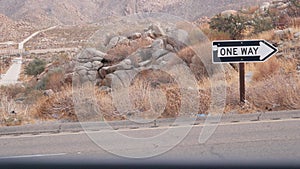 One way road sign arrow, highway roadside in California, USA road trip in desert