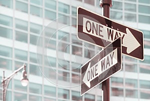 One Way road signs in New York City, selective focus, color toning applied, USA