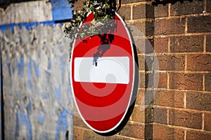 One way round sign on the wall. Traffic signs on the wall. Concept of traffic security.