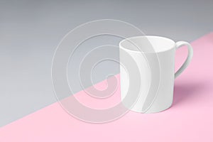 One white ceramic mug on color background, space for text