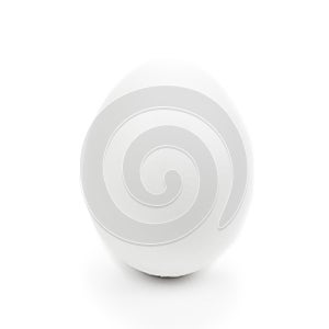 One white egg isolated on white background. Cut off. Close-up chicken egg
