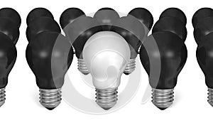 One white light bulb among many black ones