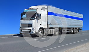 One white lorry with trailer