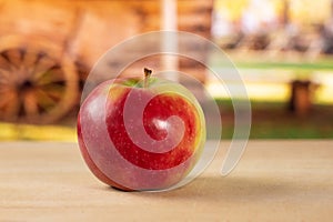 Fresh red apple james grieve with cart photo