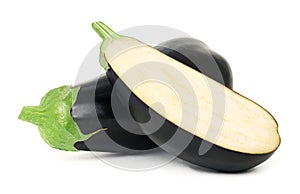 One whole and a half ripe eggplant isolated