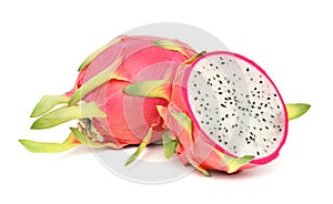 One whole and a half of ripe pitahaya isolated