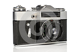 Vintage antique camera isolated on white photo