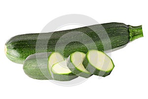 One whole zucchini and slices isolated on white
