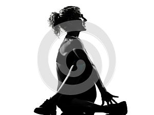 Woman warming up yoga stretching rotation fitness posture photo