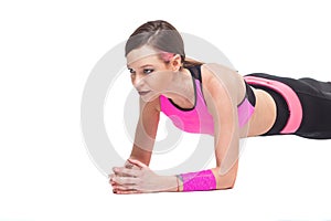One woman exercising workout fitness aerobic exercise on studio isolated white background. Perfect plank.