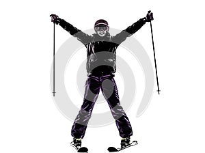 One woman skier skiing arms outstretched happy silhouette