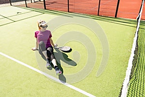 One women playing Paddle tennis