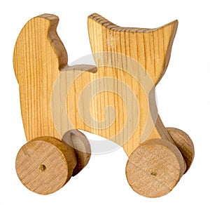 One wooden cat on the wheels