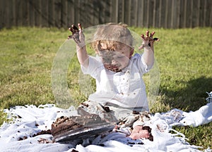 One year old baby boy chocolate cake smash