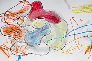 One year old child\'s hand drawing with crayons