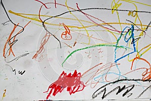 One year old child\'s hand drawing with crayons