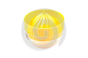 One yellow plastic juicer with transparent tank for make fresh natural juice from different fruits and vegetables isolated