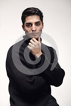 One young handsome man, handsome model, 20-29 years old, posing in studio, photo shoot. white isolated background. casual clothes