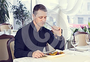 One young man dines