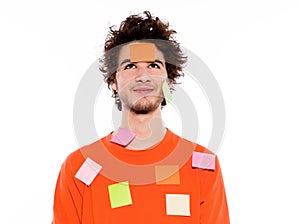 One young man portrait covered by adhesive notes