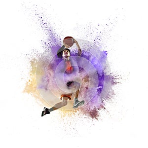 One young sportsman basketball player in explosion of colored powder explosion isolated on white background