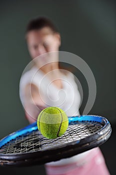 One young woman play tennis