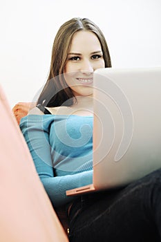 One young woman working on laptop