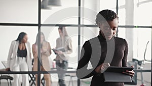 onfident businesswoman In suit working at office