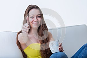 onfident woman approves with a smile