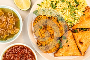 Onion Bhajis And Samosas With Pilau Rice