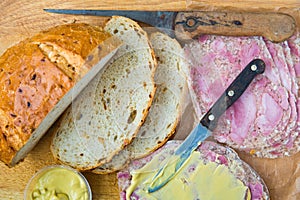 Onion bread with headcheese and mustard