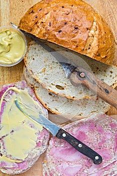 Onion bread with headcheese and mustard