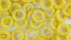 Onion chips rings concept flat light. White background background. Rotating