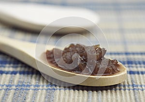 Onion Confit in a wood Spoon