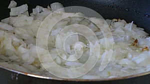Onion Frying In The Frying Pan. Cooking Process.