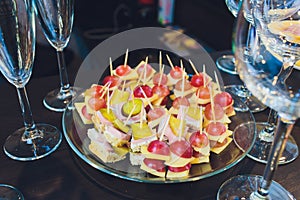 Onion and garlic colorful tapas on a silver platter.