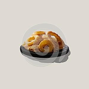 Onion rings in batter on wooden plate with shadow isolated on beige background.