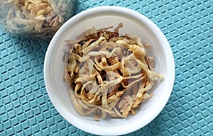 Onion stick chips or crackers, known as kripik bawang in Indonesia, very popular Indonesian traditional cuisine