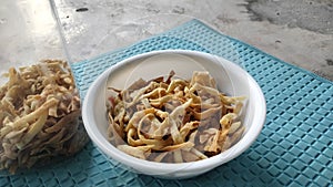 Onion stick chips or crackers, known as kripik bawang in Indonesia, very popular Indonesian traditional cuisine