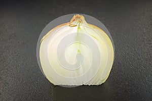 Onions on black background