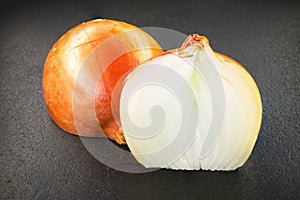 Onions on black background photo
