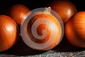 onions on black wood