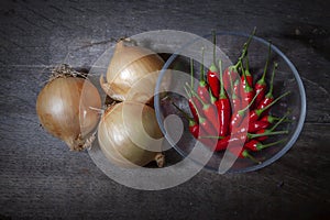 Onions and Chilly Peppers on Table
