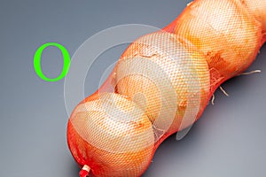 Onions in a mesh bag